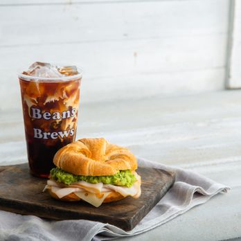 Beans & Brews Coffee House - Turkey Avocado Croissant and Cane & Cream Cold Brew - Coffee & Tea Near Me - West Jordan, Utah Beans & Brews Coffee House - Turkey Avocado Croissant and Cane & Cream Cold Brew - Coffee & Tea Near Me - West Jordan, Utah