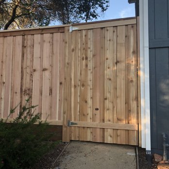 Aguilar Fence - Gate and 7' (overall height) board-on-board cedar fence with steel posts, top cap, and kick board. - Fences & Gates Near Me Aguilar Fence - Gate and 7' (overall height) board-on-board cedar fence with steel posts, top cap, and kick board. - Fences & Gates Near Me