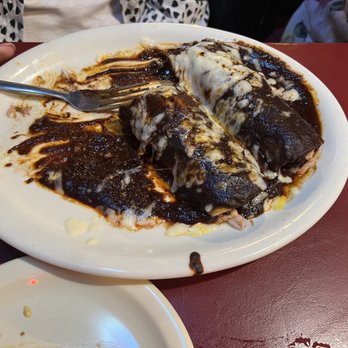 Jardin Corona - Mole Enchiladas... (she had a couple of bites before I got the pic)!  LOL - Mexican Near Me - Liberty Hill, Texas