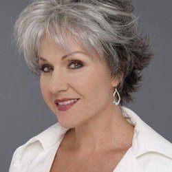Marie Vasquez - Base is salt n pepper natural. Just added high-lights on top / platinum tone short layered cut