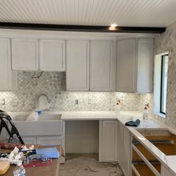 MH Improvements & Repairs - Marble backsplash installed, ready for grouting