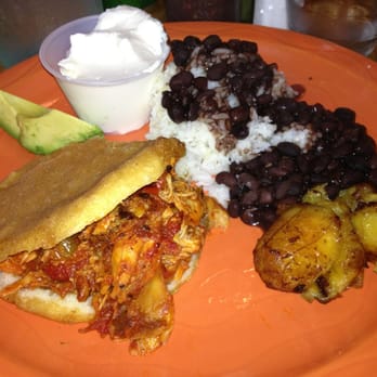 Valencia Cocina - Chicken arepa with sour cream , beans & rice, fried plantains & avocado... - Latin American Near Me - Norwalk, Connecticut Valencia Cocina - Chicken arepa with sour cream , beans & rice, fried plantains & avocado... - Latin American Near Me - Norwalk, Connecticut