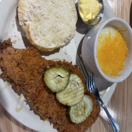 Nashville Hot Chicken Biscuit,cheesy grits.The chicken was too thin. Nashville Hot Chicken Biscuit,cheesy grits.The chicken was too thin.