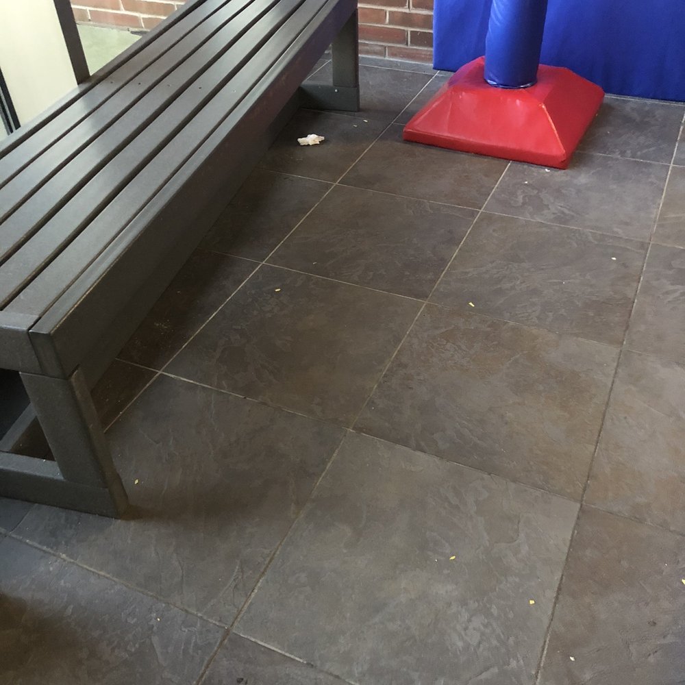 Patchogue YMCA - Tissues, little pieces of some plastic all over the floor and candy shell wrapping under the other bench as well as a mask. Yuck! - Gyms Near Me - Patchogue, New York