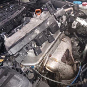 Sun Auto Tire & Service - This is Sun Auto fixing the leak in my engine's valve cover.  Fixed it, no problem. - Tires Near Me - Renton, Washington
