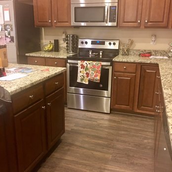 Ray's Flooring - Nick's Review; the kitchen! another work in progress but the flooring is done, matching shoe molding under the cabinets - Flooring Near Me - Charleston, South Carolina