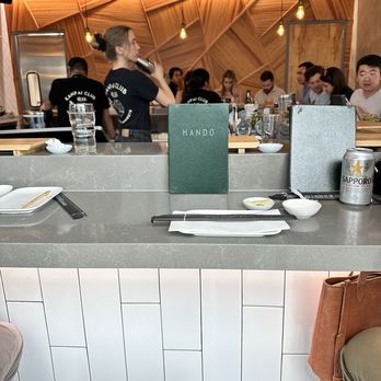 Hando - Bar area and kitchen - Sushi Bars Near Me - Houston, Texas