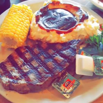 Huckleberry Square - 10.99 for an 8oz steak with mash, corn, dinner roll, and a side salad !! - American Near Me - Burien, Washington