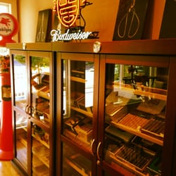 Main Street Barbershop - Premium cigars in humidors.