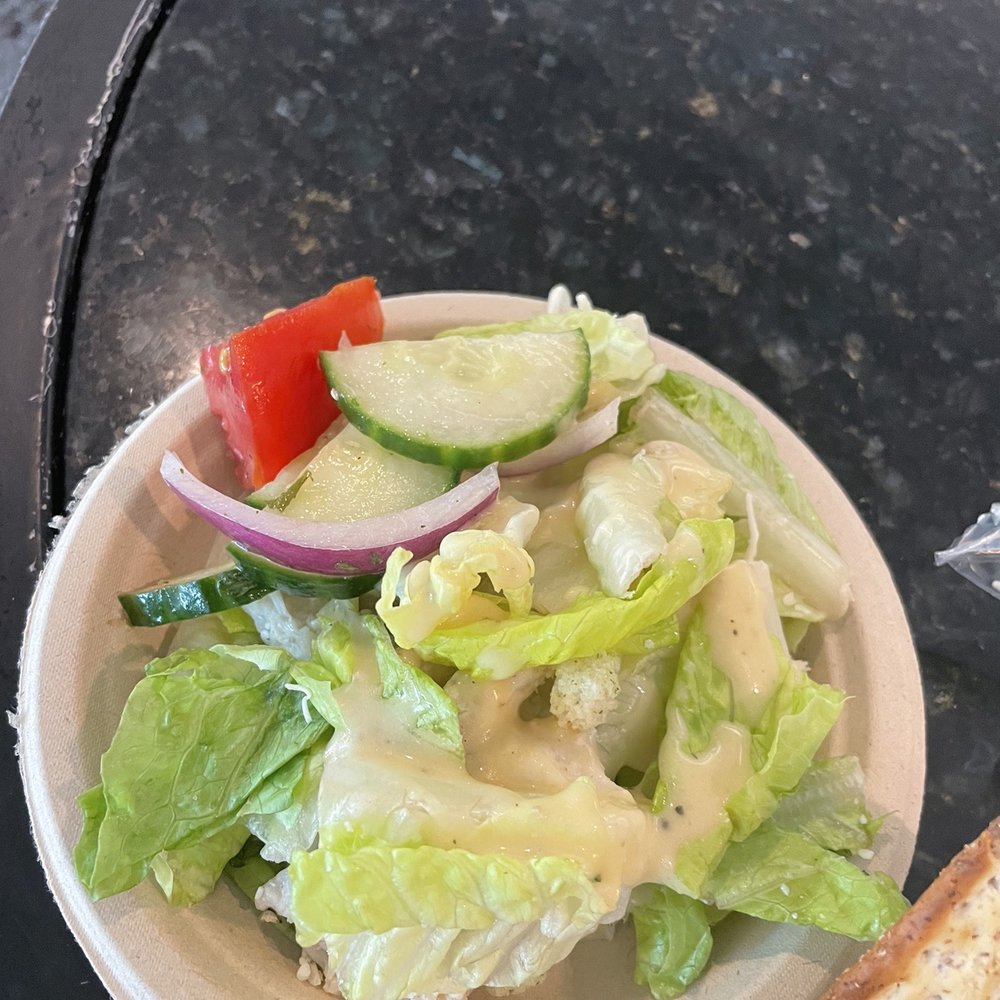 Delta Sky Club - Chicken Cesar salad and cucumber tomato onion salad - Airport Lounges Near Me - Hebron, Kentucky Delta Sky Club - Chicken Cesar salad and cucumber tomato onion salad - Airport Lounges Near Me - Hebron, Kentucky