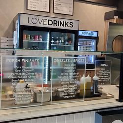 Love Pizza - After baked options listed on glass