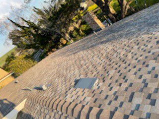 Slide of Aguilar Roofing