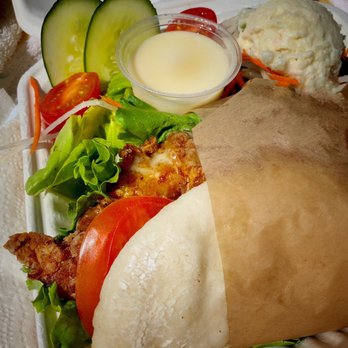 Kikuchi's - Ginger Karaage Steamed Bun with salad - Food Trucks Near Me