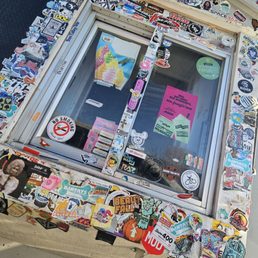 I love all the stickers at the window