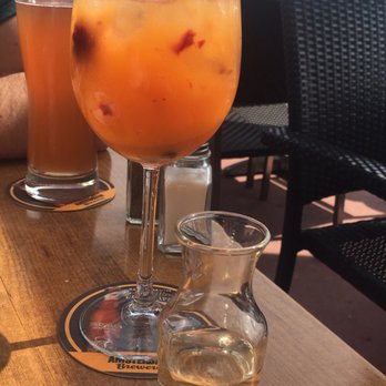 Amsterdam BrewHouse - Sangria with white wine and real peaches. It was delicious! Worth the $11. - Breweries Near Me - Toronto, Ontario