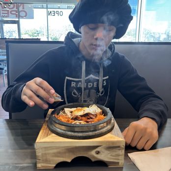 Burning Rice - My son with his amazing hot bowl - Korean Near Me - Frisco, Texas Burning Rice - My son with his amazing hot bowl - Korean Near Me - Frisco, Texas