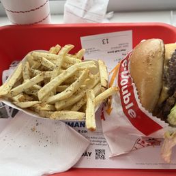 Double double (onions, grilled onions, extra tomatoes), friends and a medium drink Double double (onions, grilled onions, extra tomatoes), friends and a medium drink