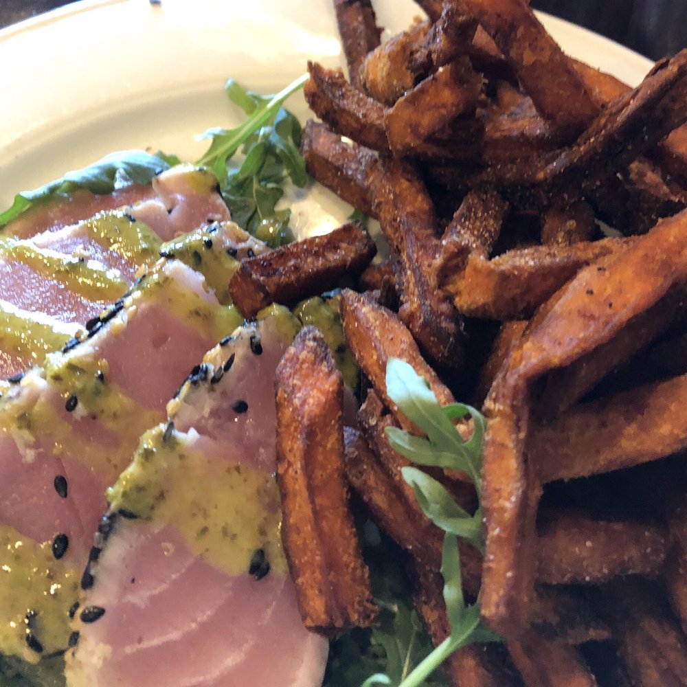 Dilly. Bistro, Bar & Bottle Shop - Ahi tuna salad - served with sweet potato fries - New American Near Me - Cincinnati, Ohio Dilly. Bistro, Bar & Bottle Shop - Ahi tuna salad - served with sweet potato fries - New American Near Me - Cincinnati, Ohio