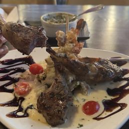 This is the lamb chop volcano. It comes with mashed potatoes, spinach and shrimp. Excellent. This is the lamb chop volcano. It comes with mashed potatoes, spinach and shrimp. Excellent.