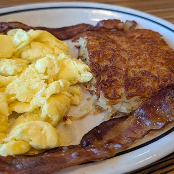IHOP - Scrambled with bacon and hashbrowns - Breakfast & Brunch Near Me - Seattle, Washington IHOP - Scrambled with bacon and hashbrowns - Breakfast & Brunch Near Me - Seattle, Washington