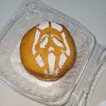 The Grim Bakers - Strawberry Scream.  Donut filled with amazing cream and fresh strawberries - Bakeries Near Me - San Antonio, Texas