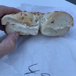 Beach Bagel & Deli - Here's what a $5 bagel with vegetable cream cheese looks like. It sucked bad