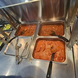 The Indian Cuisine - Tandoori chicken, butter chicken, vindaloo chicken and goat curry