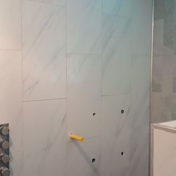 Wyatt Home Services - Shower walls with Bluetooth and light enabled shower head fixture - Tiling Near Me - Independence, Missouri Wyatt Home Services - Shower walls with Bluetooth and light enabled shower head fixture - Tiling Near Me - Independence, Missouri
