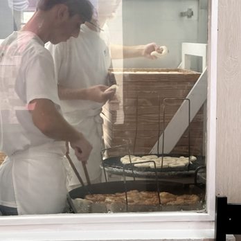 Britt's Donuts - Doughnuts being fried - Donuts Near Me - Carolina Beach, North Carolina Britt's Donuts - Doughnuts being fried - Donuts Near Me - Carolina Beach, North Carolina