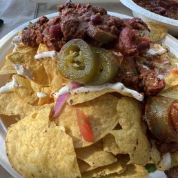 Nachos with chili and homemade pickled jalepenos