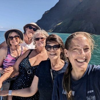 Blue Dolphin Charters - Nāpali Coastline with crew member Olivia - Boating Near Me - Eleele, Hawaii
