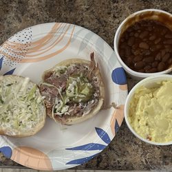 Whitt's Barbecue - Hermitage - BBQ pulled pork sandwich. Small sides of beans and potato salad.