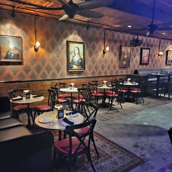 Copper 29 Bar - Wall of portraits - Bars Near Me - Coral Gables, Florida