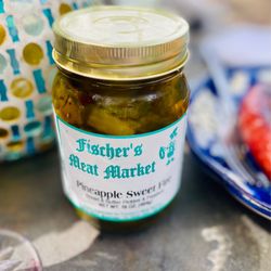 Fischer's Meat Market & Grocery - LOVE! My fave pickles on earth. "Pineapple Sweet fire" Bread & butter with jalapeño & pineapple :)...