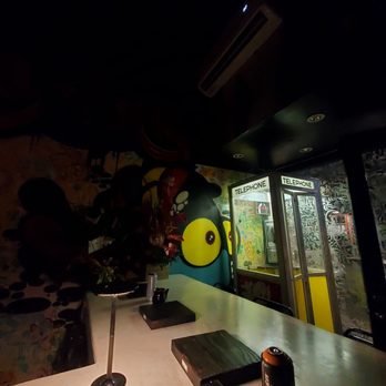 Obake - Telephone booth in the corner. - Cocktail Bars Near Me - Honolulu, Hawaii