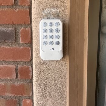 Olympus Garage Door Repair - The outdoor keypad, again not what we asked for - Garage Door Services Near Me - Tempe, Arizona