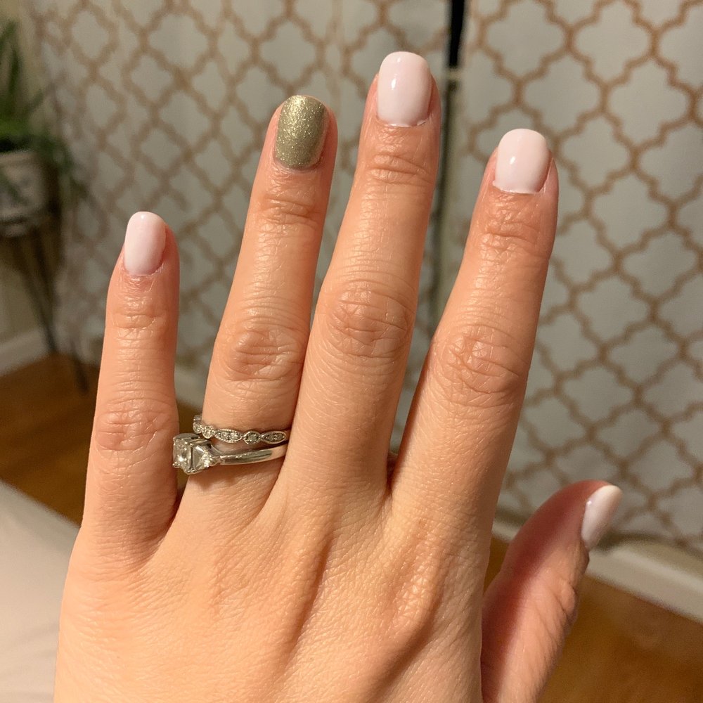 Blotchy paint job, cuticle full of polish and lopsided middle nail Blotchy paint job, cuticle full of polish and lopsided middle nail