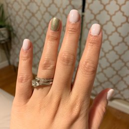 Blotchy paint job, cuticle full of polish and lopsided middle nail Blotchy paint job, cuticle full of polish and lopsided middle nail