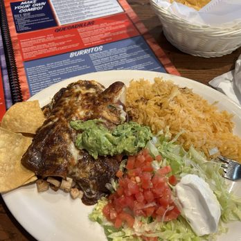 Taco Fiesta - Chicken enchilada with mole sauce. Added 2ounce guacamole for $1.99 - Mexican Near Me - Horse Shoe, North Carolina