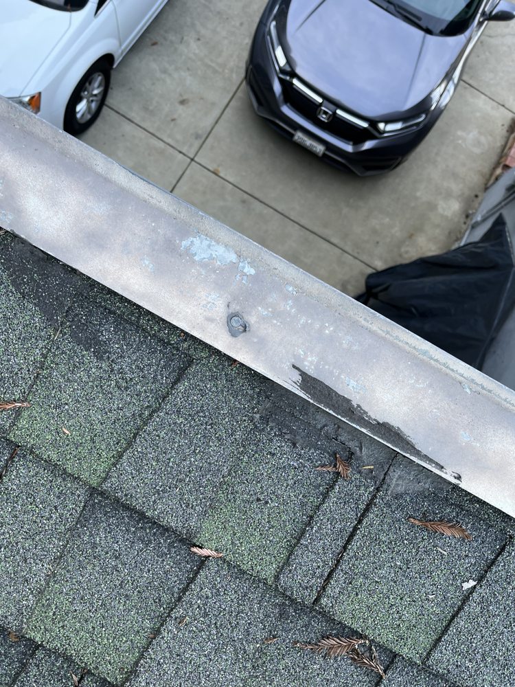 Slide of Milan Roofing