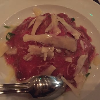 Oliveto - Raw beef slices with rocket, Parmesan shavings and truffle oil - Italian Near Me - London, XGL