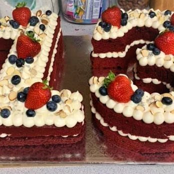 Bake Someone Happy - a red velvet cake with white frosting and strawberries - Desserts Near Me Bake Someone Happy - a red velvet cake with white frosting and strawberries - Desserts Near Me