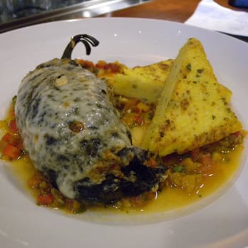 Seasons 52 - Chile Relleno Stuffed with Chicken & Goat Cheese served with Corn Cakes. - New American Near Me - Costa Mesa, California Seasons 52 - Chile Relleno Stuffed with Chicken & Goat Cheese served with Corn Cakes. - New American Near Me - Costa Mesa, California