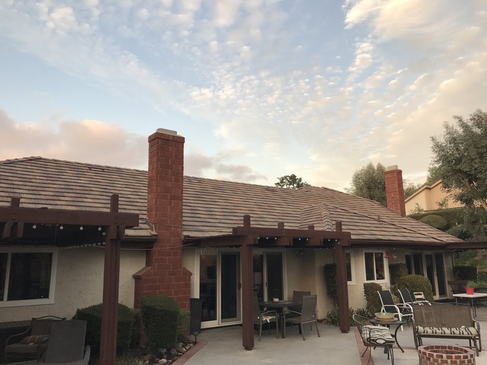 Slide of Valencia Roofing Company