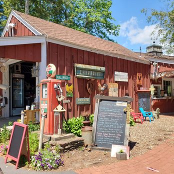 The Apple Place - a red building with a sign in front of it - Donuts Near Me - East Longmeadow, Massachusetts