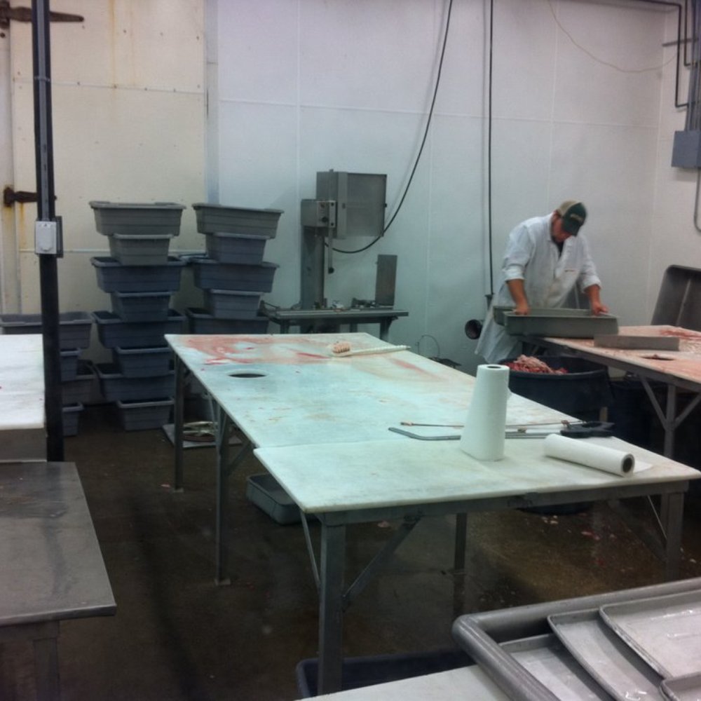 Dutch Valley Meats - a man working in a kitchen - Meat Shops Near Me - Arthur, Illinois