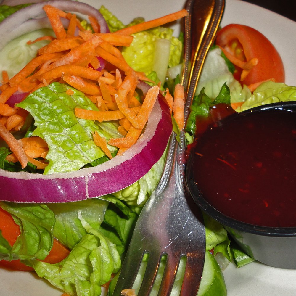 Pirate's Cove Restaurant - Salad with raspberry vinegarette - Seafood Near Me - Chesapeake, Virginia Pirate's Cove Restaurant - Salad with raspberry vinegarette - Seafood Near Me - Chesapeake, Virginia