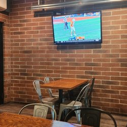 University Roadhouse - Outdoor/garage door open air area with tvs and lots of table!!!  Crock of Meatballs