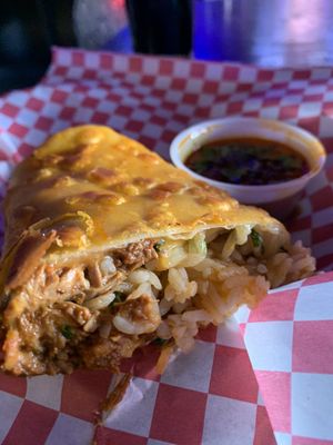 Photo of Brannan Manor - Sacramento, CA, US. Birria Burrito- Crunchy tortilla, rice and side of birria sauce. Pretty good