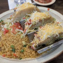 El Potro Mexican Cafe - Crunchy tacos loaded with cheese and toppings!